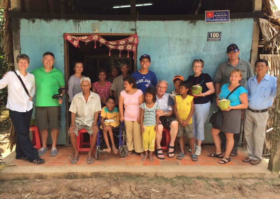 cerebral palsy team for team pic visiting boy with cp in mekong delta vietnam